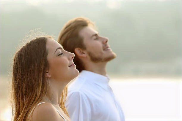 Couple breathing calmly after airway therapy Couple breathing deeply and calmly